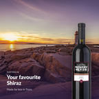 Bottle of En Primeur Winery Series Shiraz in an Atlantic Canadian setting