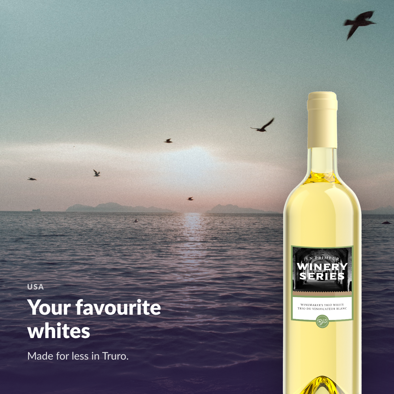 En Primeur Winery Series Winemaker's Trio White bottle against an Atlantic Canadian seascape