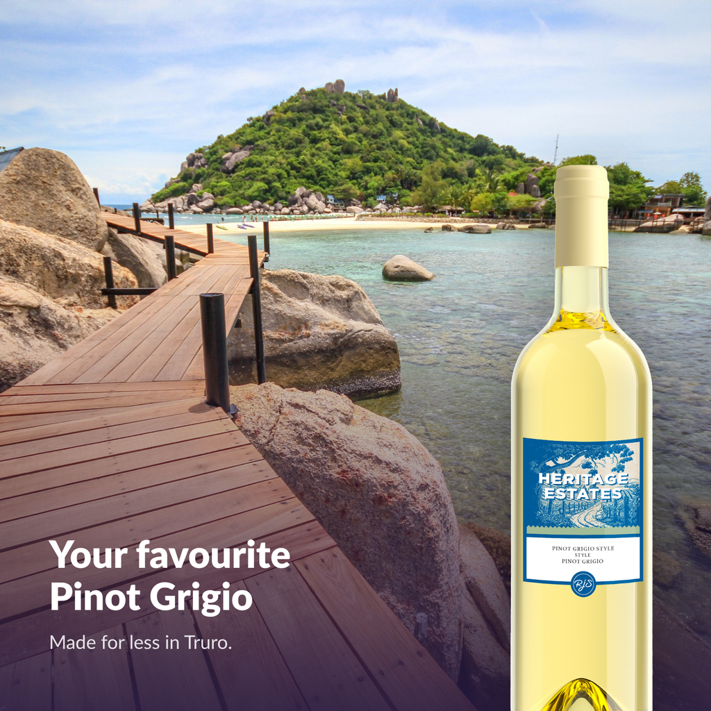 Heritage Estates Pinot Grigio bottle on a seaside boardwalk