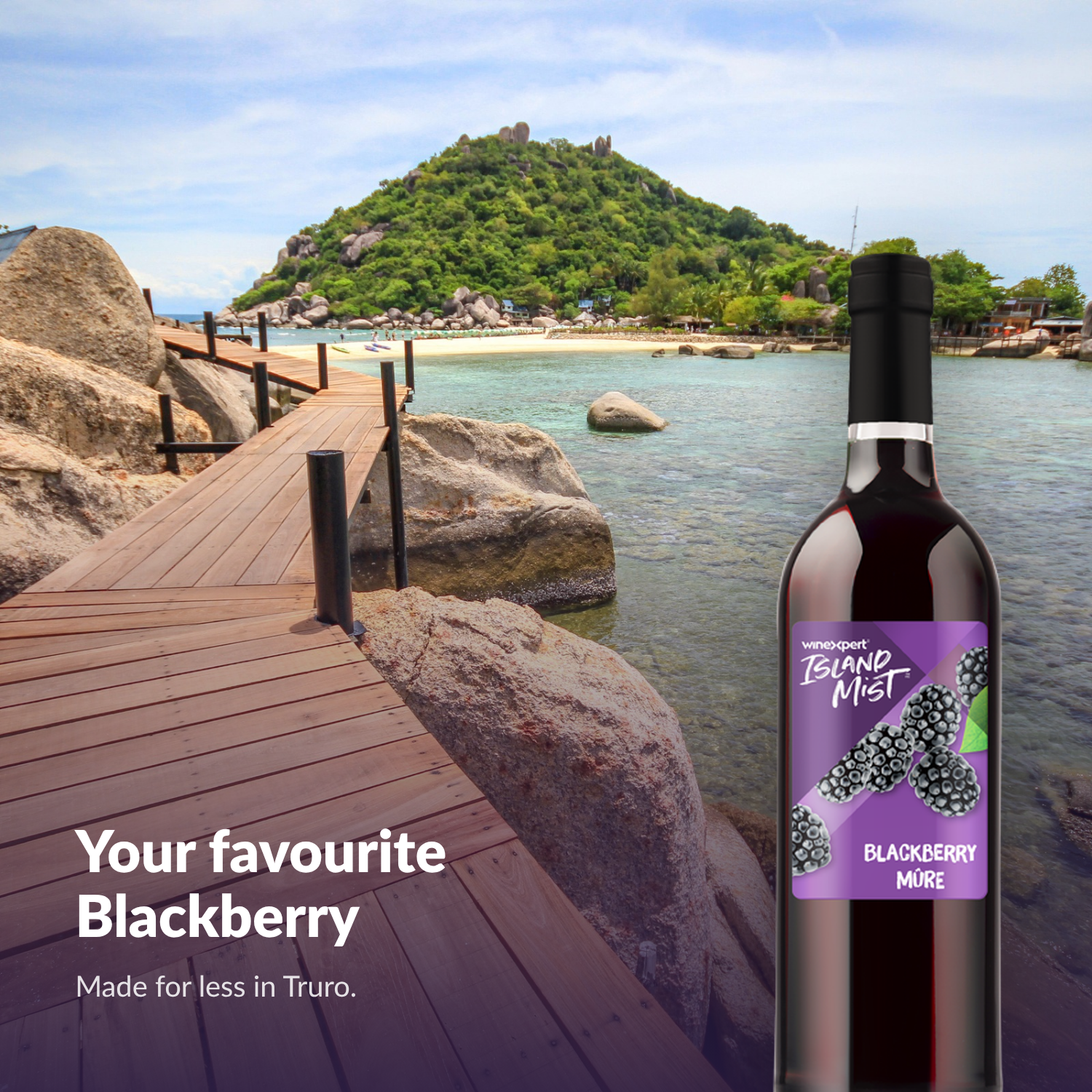 Island Mist Blackberry bottle by the ocean