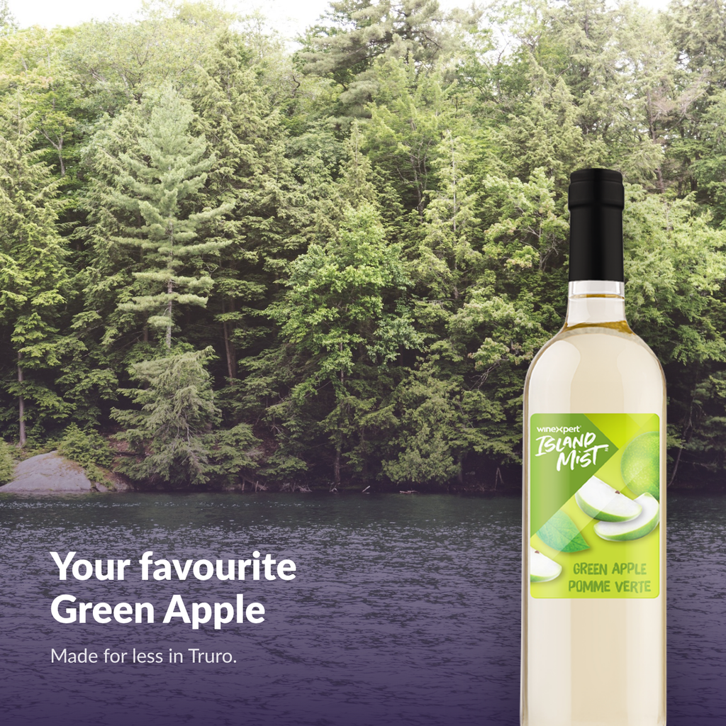 Island Mist Green Apple bottle by a forest lake