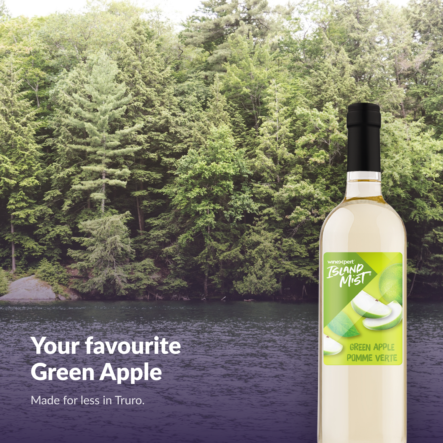 Island Mist Green Apple bottle by a forest lake