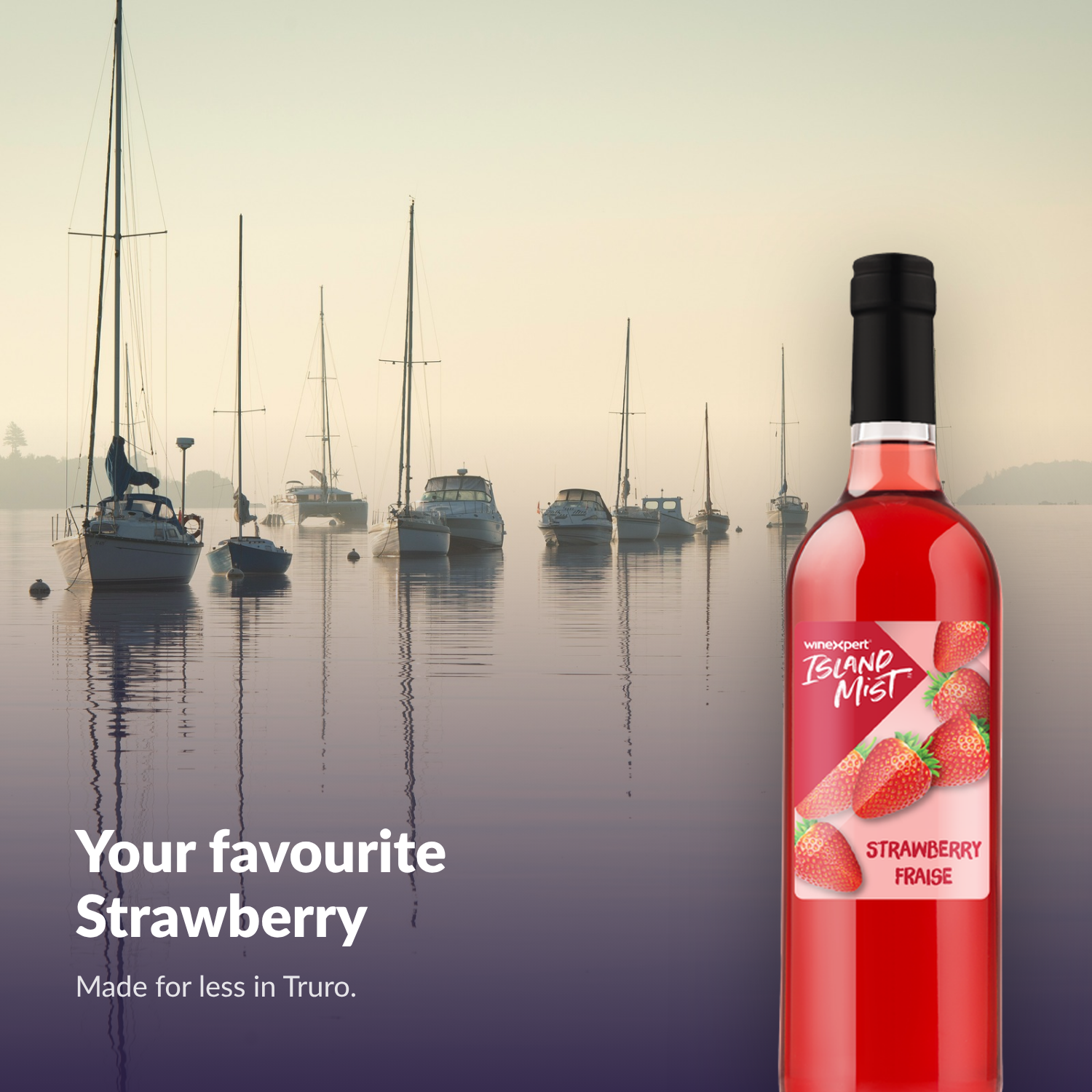 Island Mist Strawberry bottle by a misty harbour