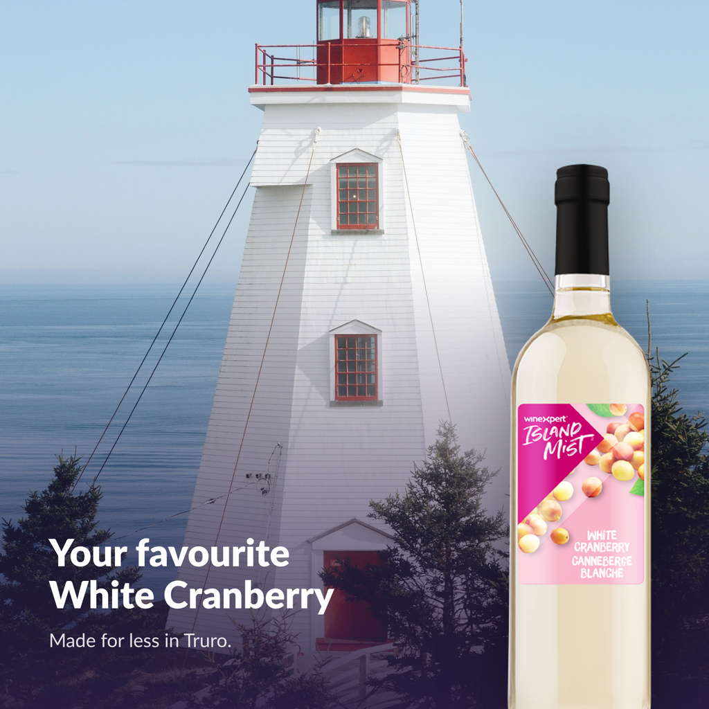 Island Mist White Cranberry bottle by a lighthouse