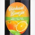 Close-up of the Orchard Breezin' Seville Orange Sangria bottle label