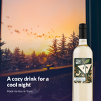 Twisted Mist Caramel Apple Martini bottle by a window at sunset on a cool evening