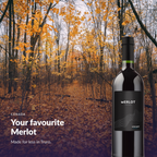 Bottle of Winexpert Reserve Merlot Niagara against golden autumn woods
